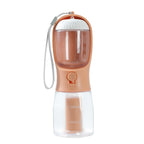 All-in-one pet travel cup with water and food compartment + poop bag dispenser
