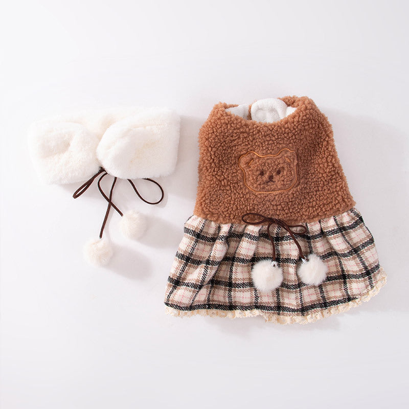 Plush dog clothes with a plaid skirt and scarf