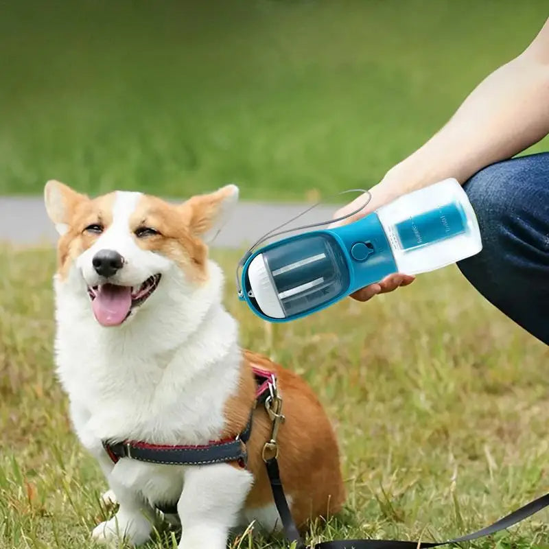 All-in-one pet travel cup with water and food compartment + poop bag dispenser