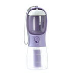 All-in-one pet travel cup with water and food compartment + poop bag dispenser