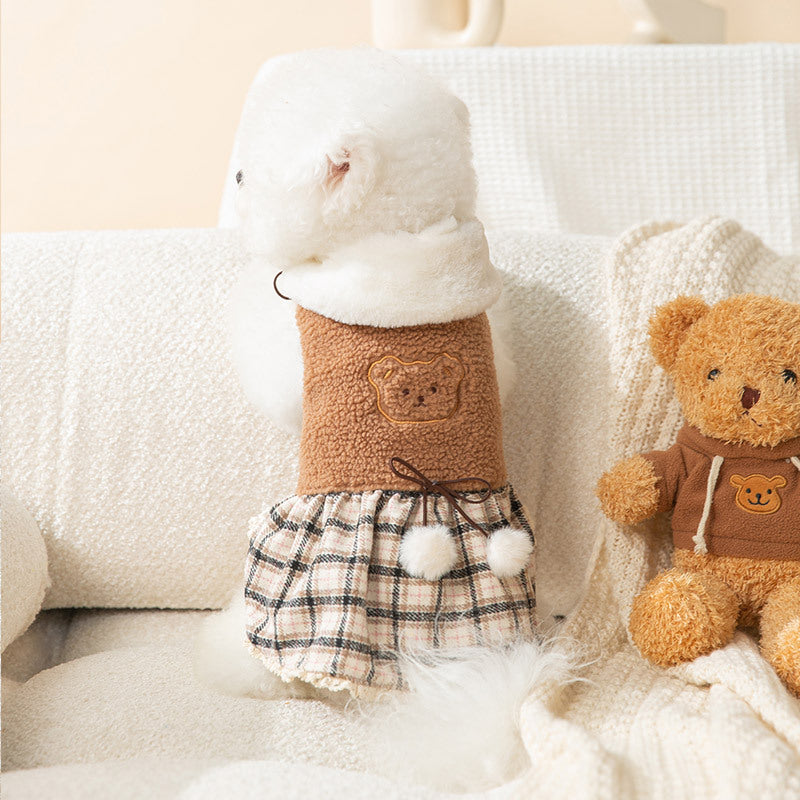 Plush dog clothes with a plaid skirt and scarf