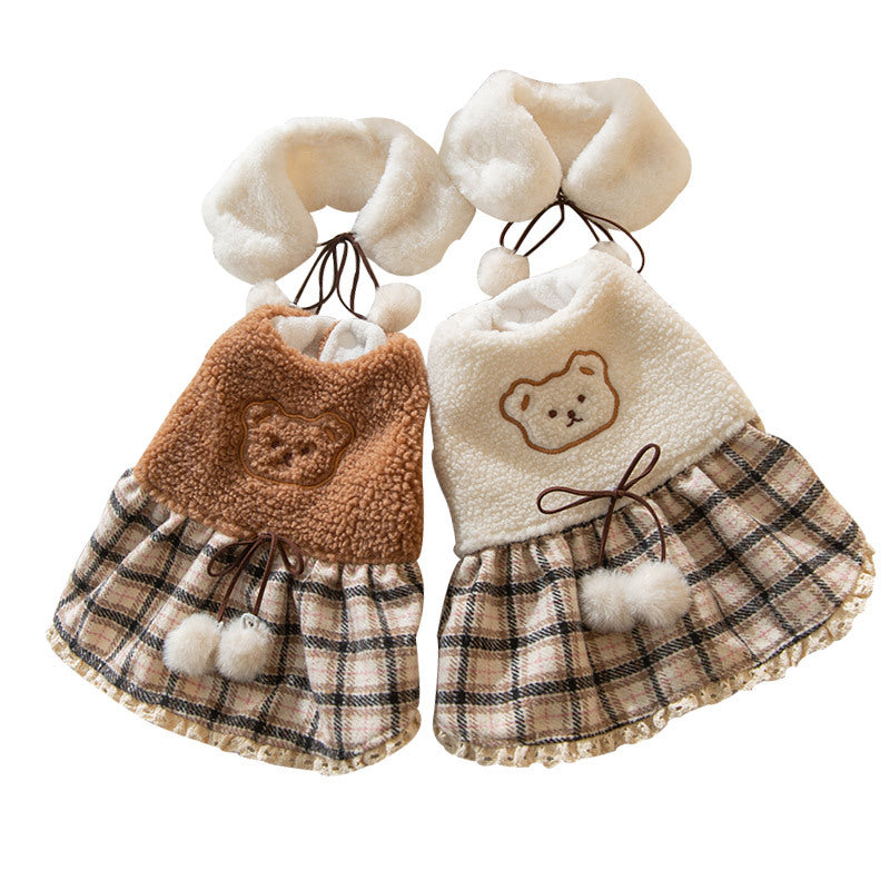 Plush dog clothes with a plaid skirt and scarf